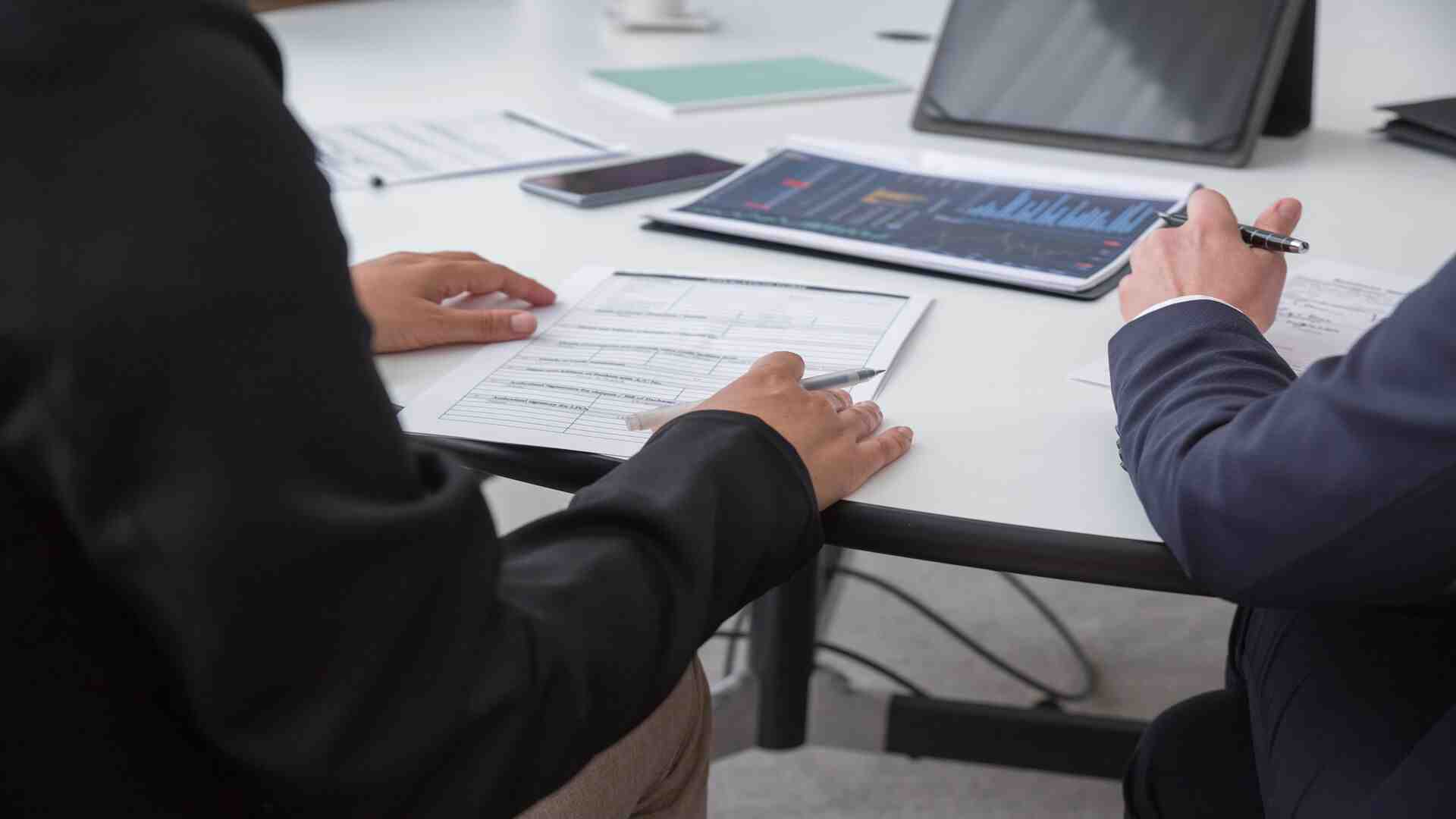Corvian Advisory principal reviewing deal financials
